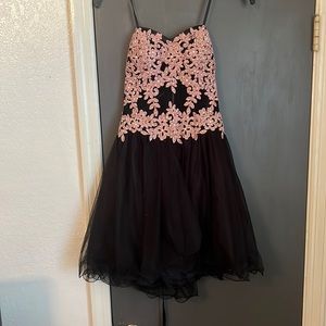Short black dress with pink design, size 5